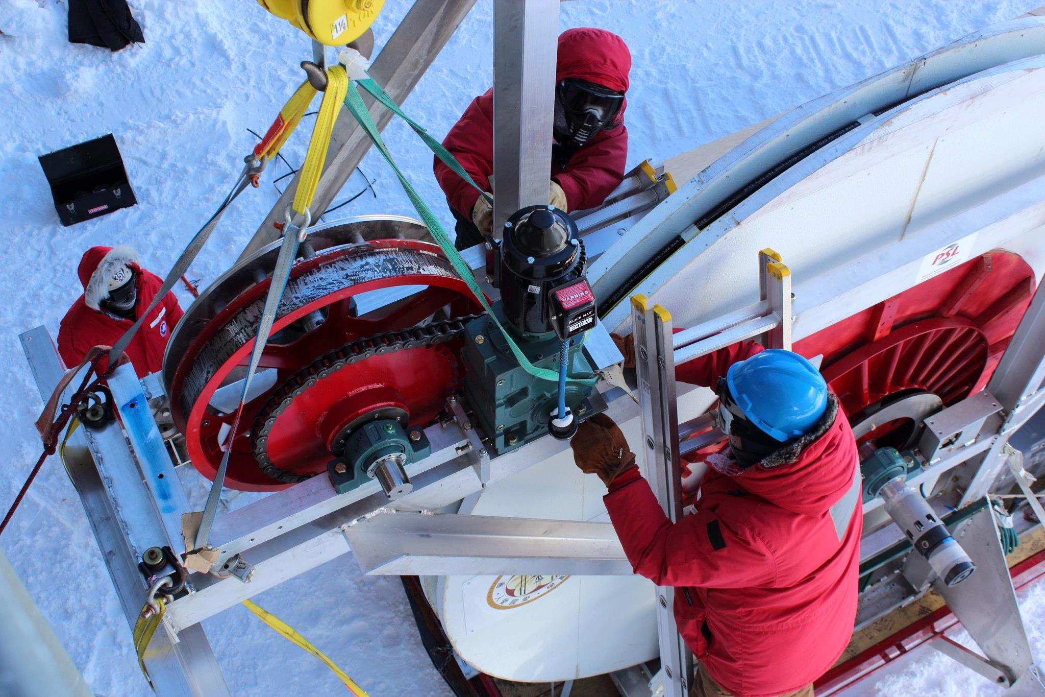ARA construction at the South Pole, 2012-2013 season. The drill hose reel is being connected.