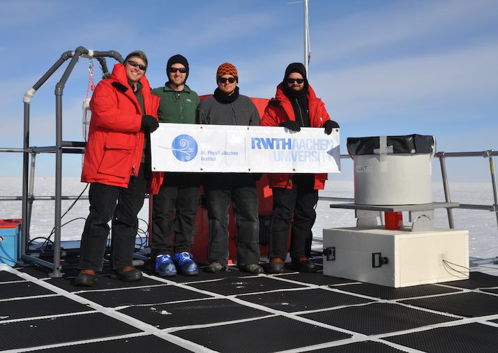 John Kelley, John Felde, Leif Rädel, and Aongus Ó Murchadha with the assembled IceACT telescope (right). Credit: IceCube/NSF