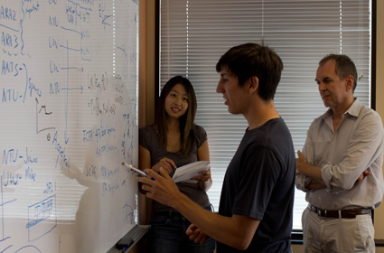 Members of the IceCube Collaboration put their brains together at the Wisconsin IceCube Particle Astrophysics Center in Madison, WI. <br />Photo by:  L. Norris/NSF